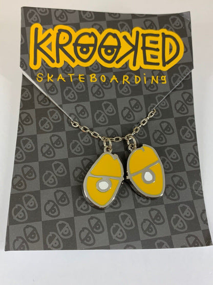 Krooked Eyes Skateboard Pendant mens unisex Necklace Silver/Yellow NWT